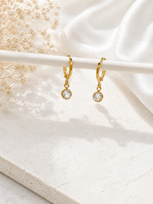 gold-toned huggie hoop earrings